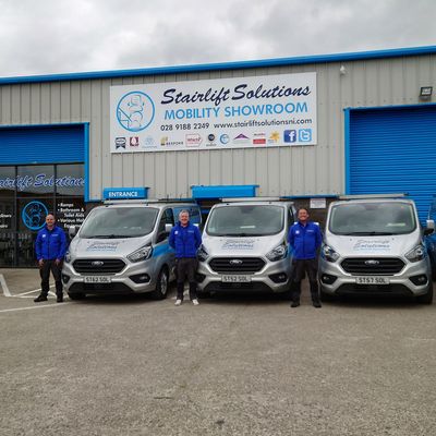 Stairlift Solutions team and vans at the mobility showroom, Northern Ireland